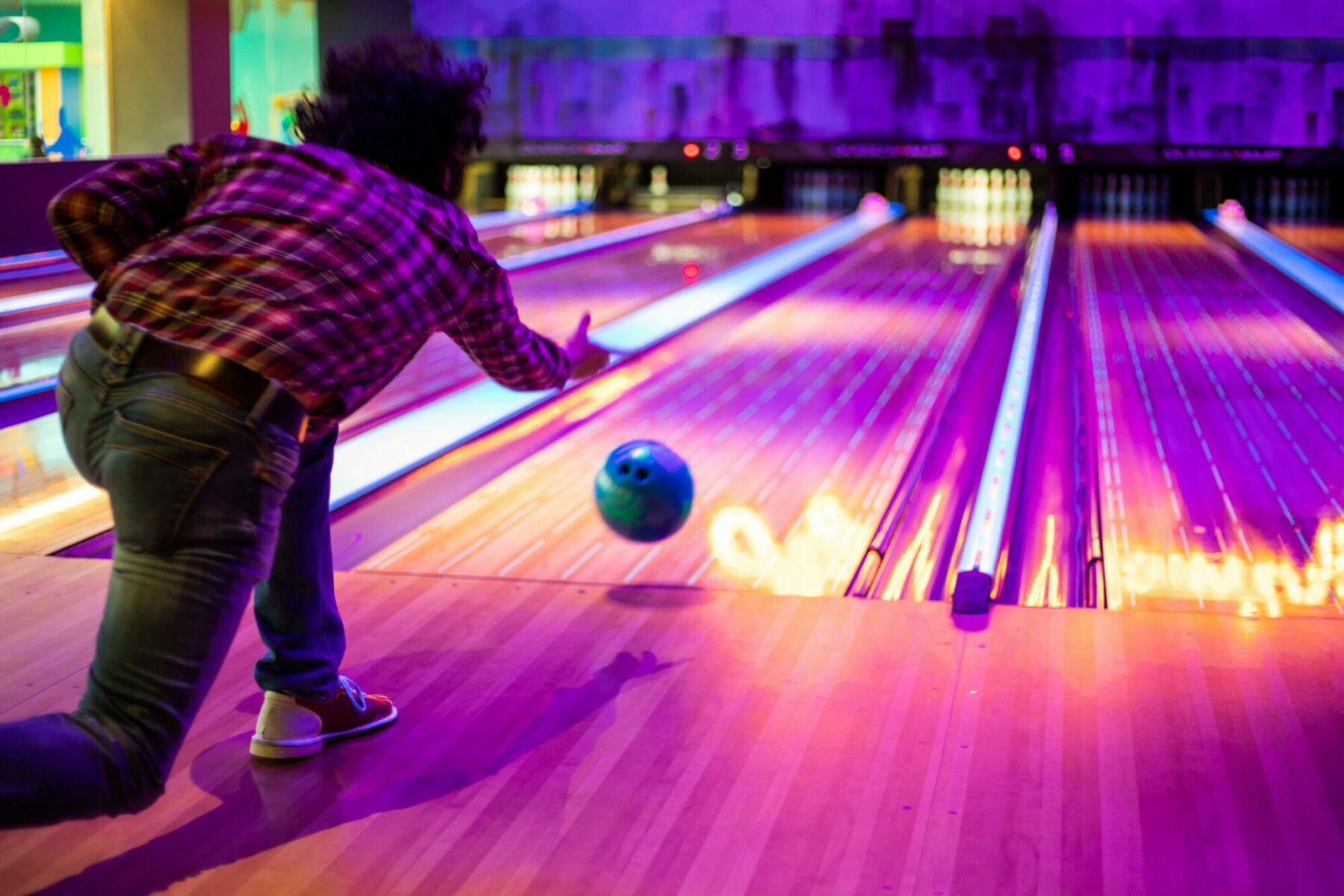 A Man Bowling During Twilight Adventures in Bexley Hub